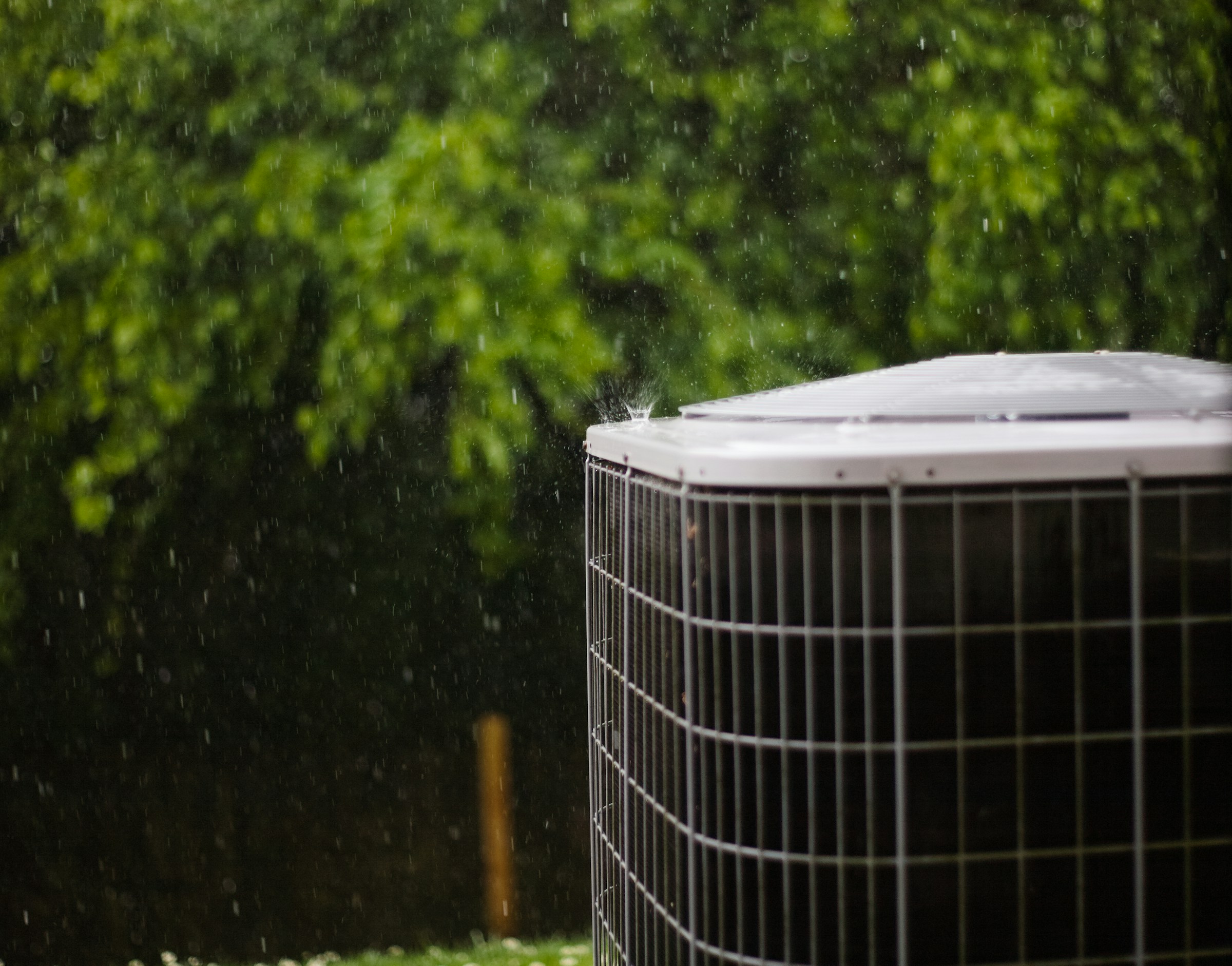 Outdoor condenser unit in the rain